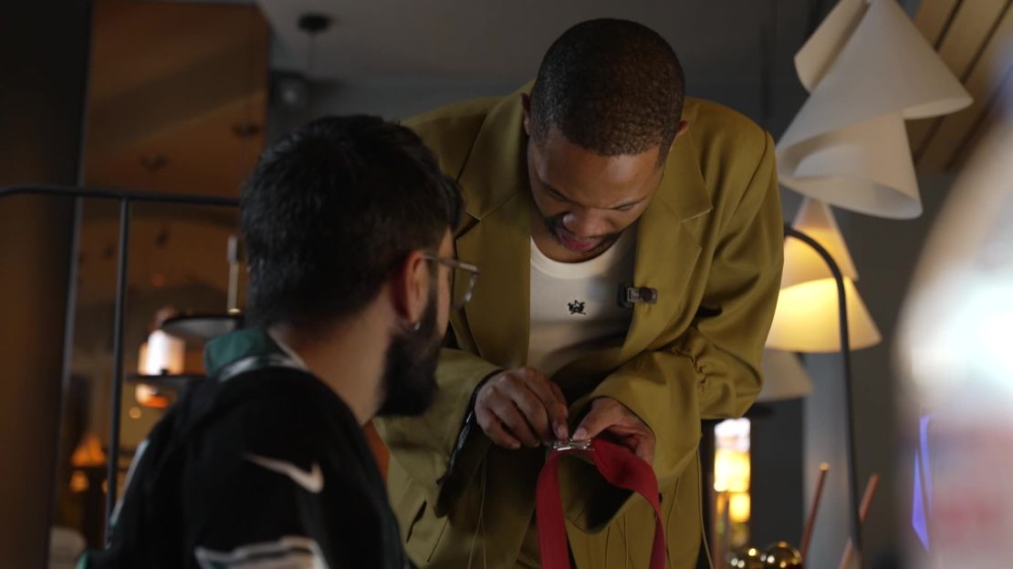 South African designer Thebe Magugu (right) makes final touches to his collection before showcasing it at Tranoi Paris in September 2024.