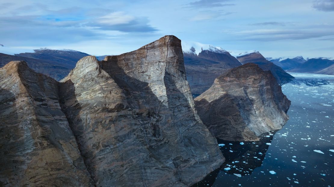 Ingmikortilaq mountain stands at a staggering 3,750 ft.