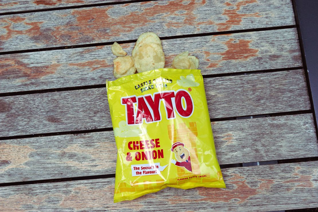 There are two Irish Tayto companies, but only the Northern Irish one (pictured) has the rights to sell in the UK. The Republic of Ireland Tayto, founded in 1954 by Joe "Spud" Murphy, invented the flavored crisp.
