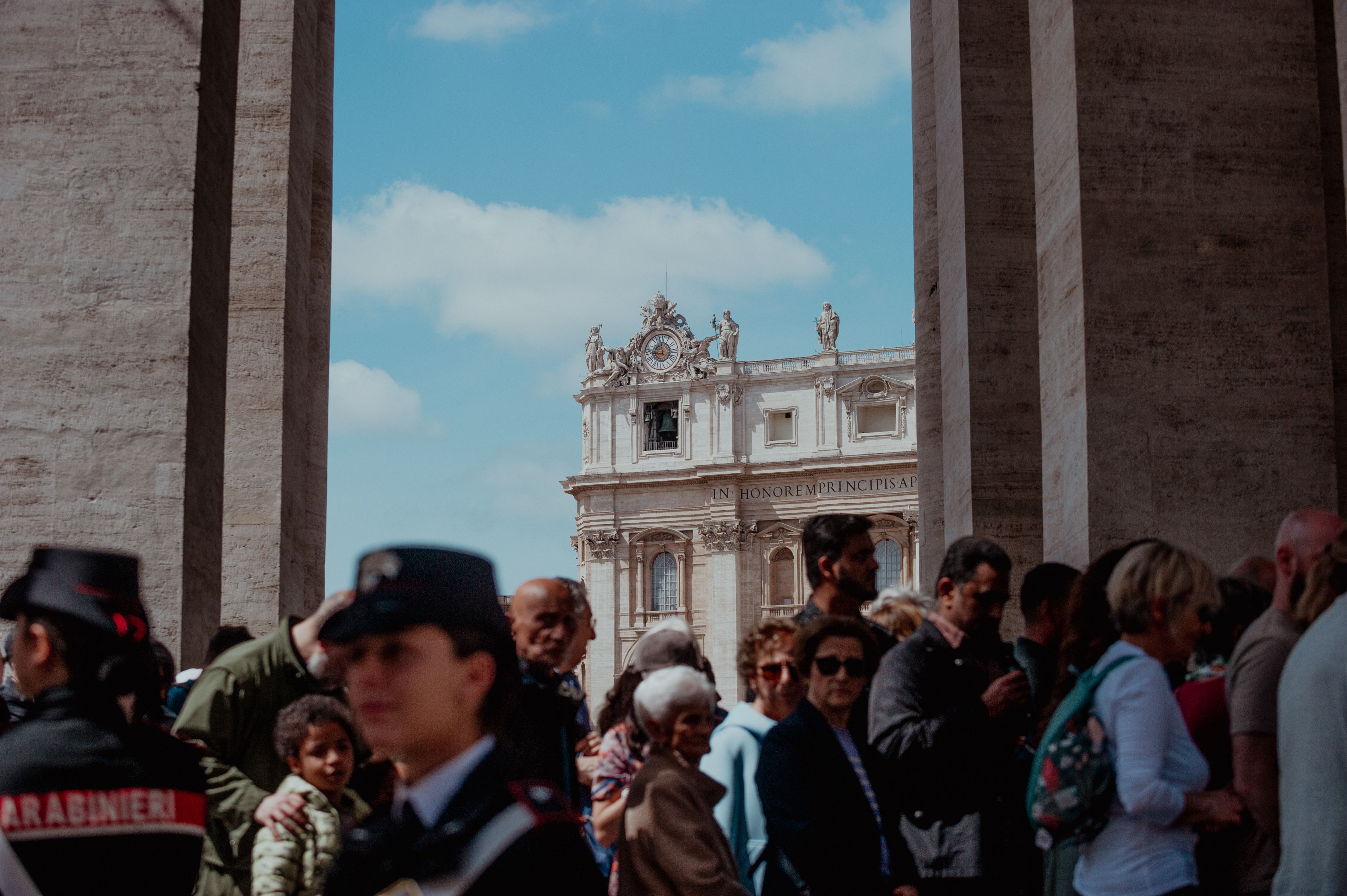 People line up in St. Peter's Square on Wednesday.