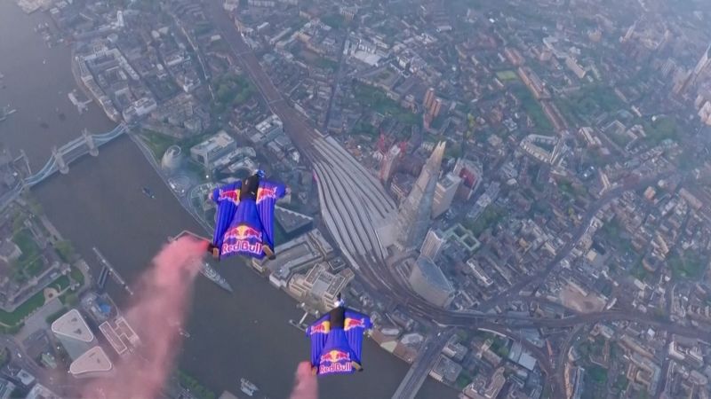 Skydivers become the first to fly through London’s Tower Bridge