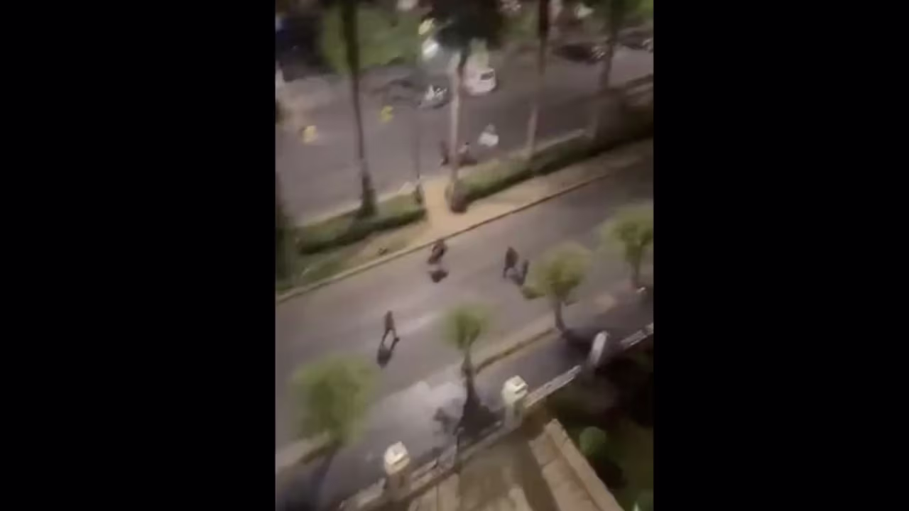This screengrab, taken from a social media video, shows troops seen fleeing Damascus’ Al-Maliki area, where Bashar al-Assad’s palace is located, on December 8.