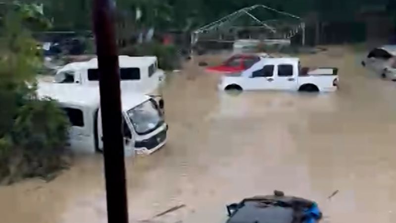 Floodwater submerges cars in the Philippines