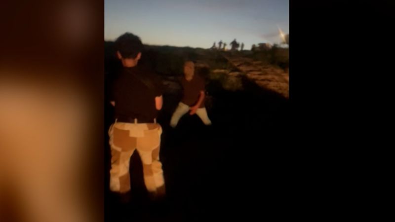 Video shows Israeli settlers throwing rocks at activists in the West Bank