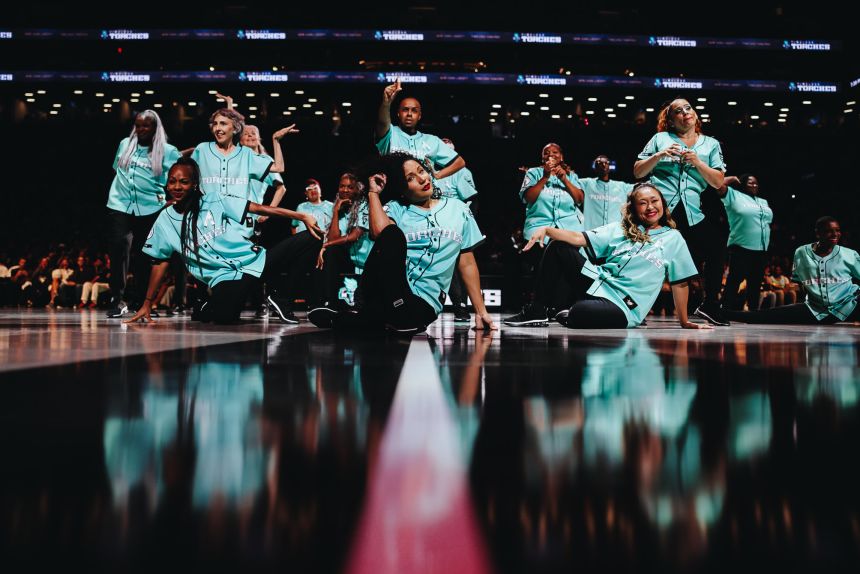 The Timeless Torches dance during a New York Liberty game.