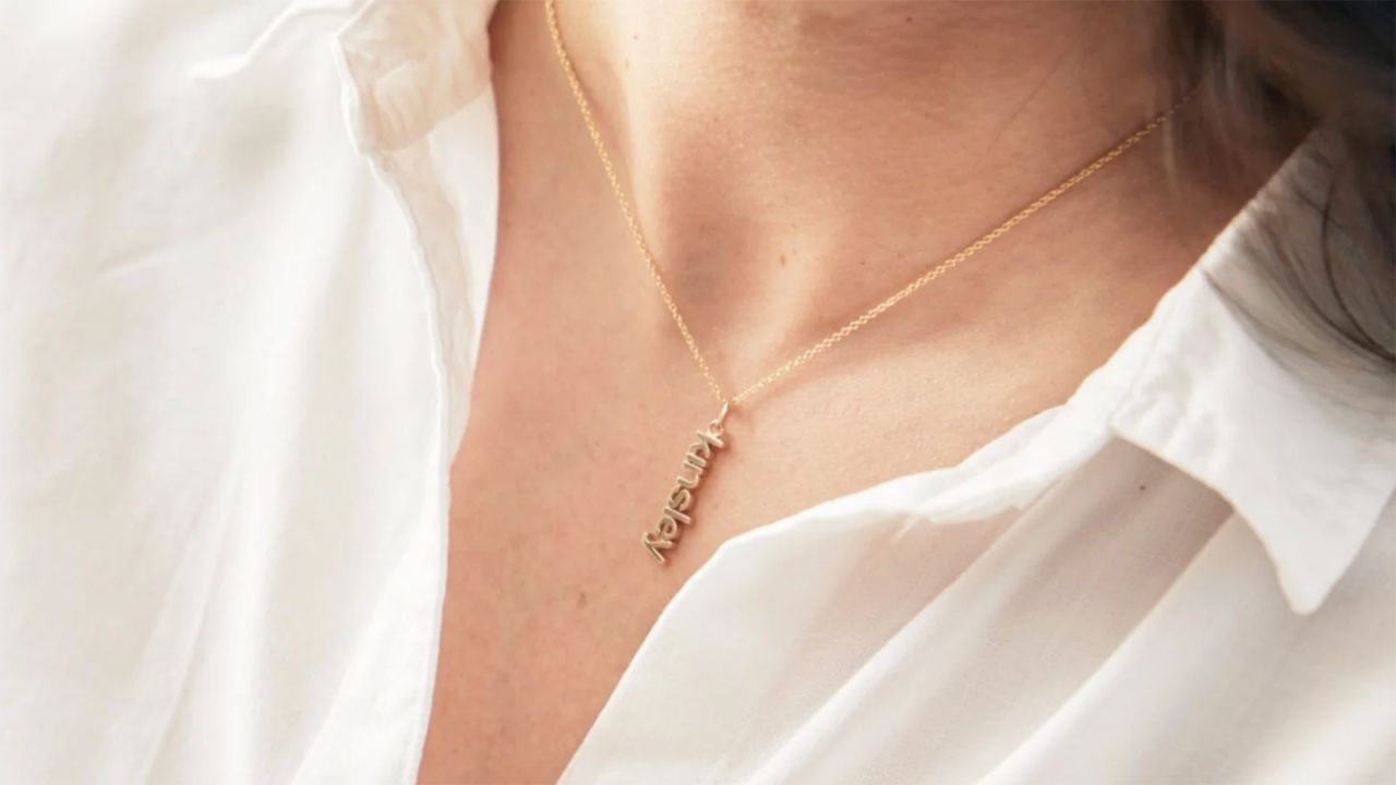 tiny tags gold necklace.jpg