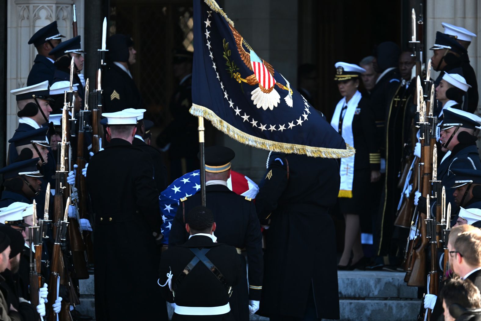 Carter's casket is brought into the cathedral.