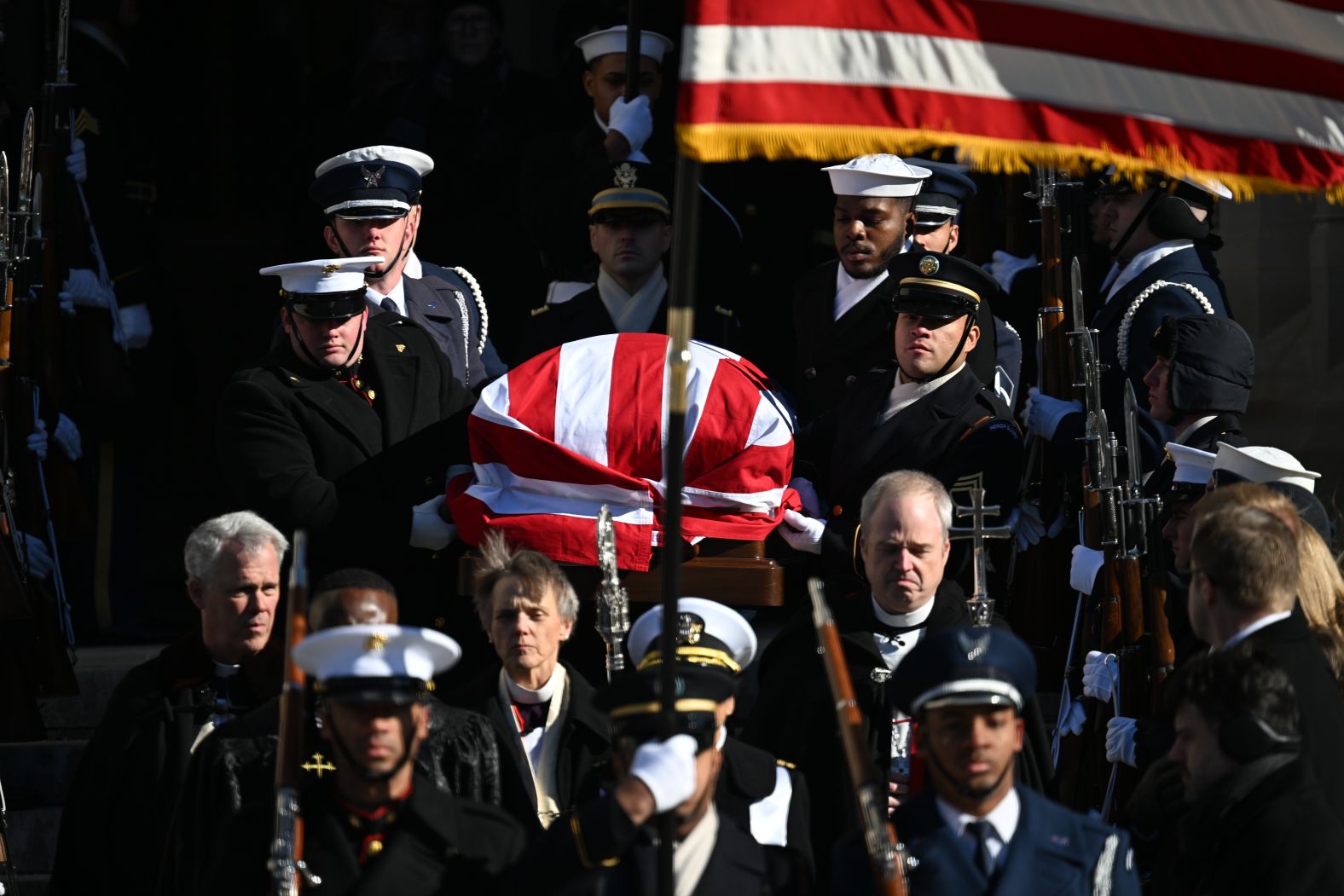 Carter's casket is carried out of the cathedral after his funeral.