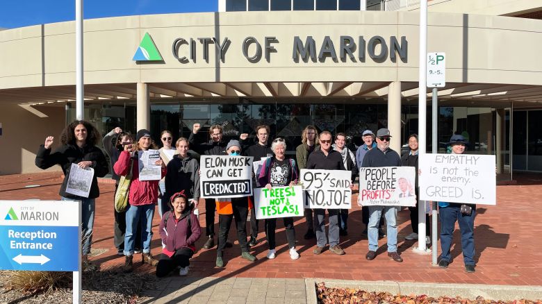 Campaign group Trees Not Teslas rallied outside the Marion Council building to protest against the proposed Tesla factory in Tonsley, South Australia, on Wednesday, June 4, 2025.
