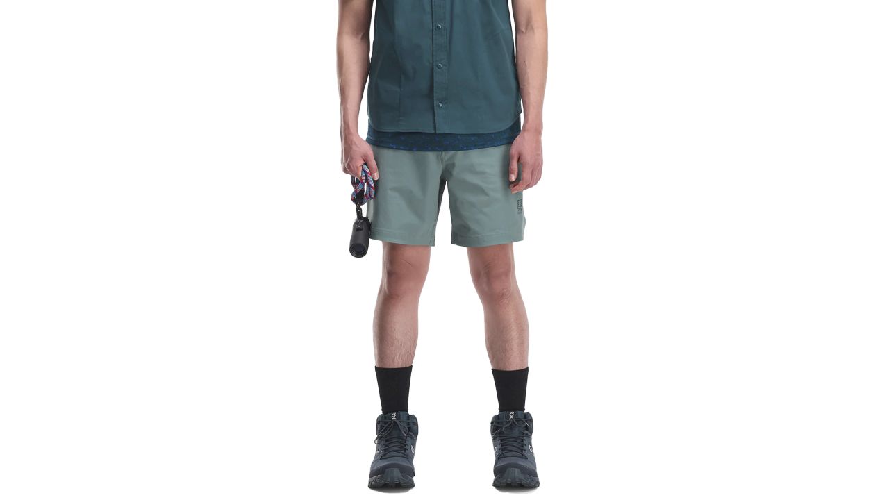 Man wearing Topo Designs Global Shorts in pond blue