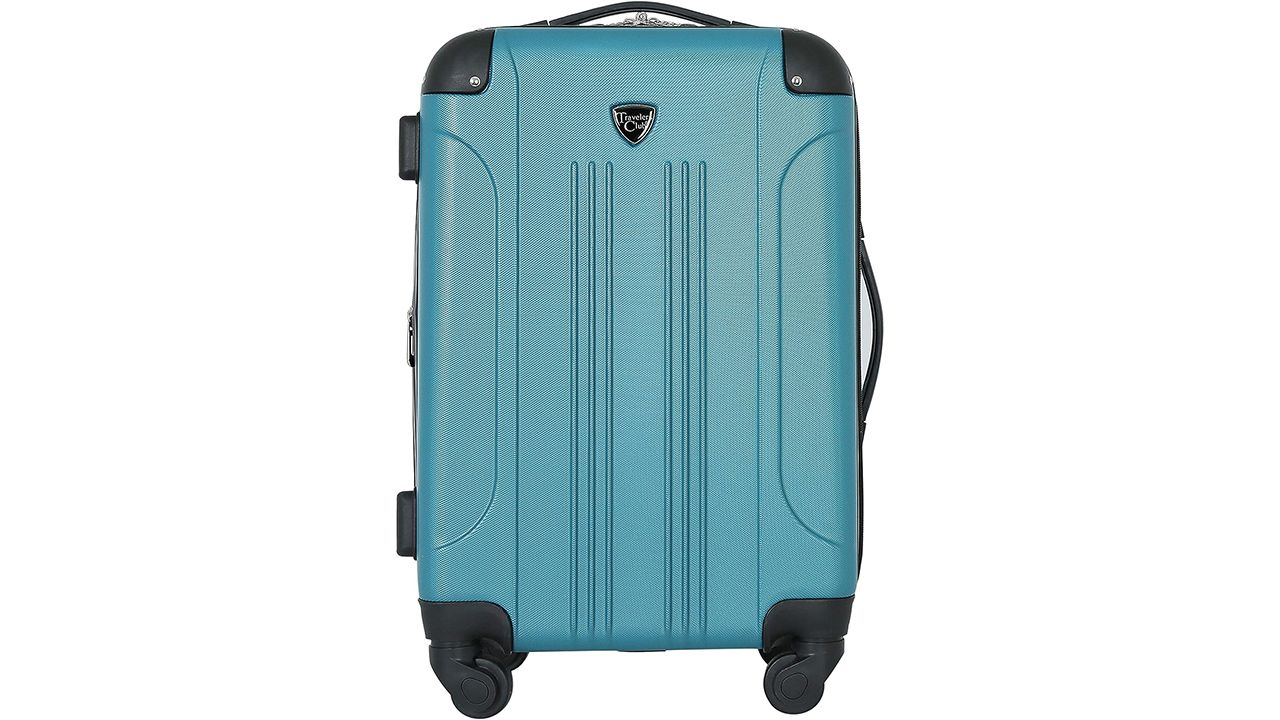 A photo of a blue Travelers Club Chicago Hardside Expandable Spinner Luggage