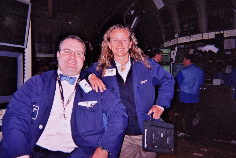 Trudi Wagner, a former NYSE floor broker, poses for a photo with another broker, Ronald Moser, during her time at the New York Stock Exchange in 2007.