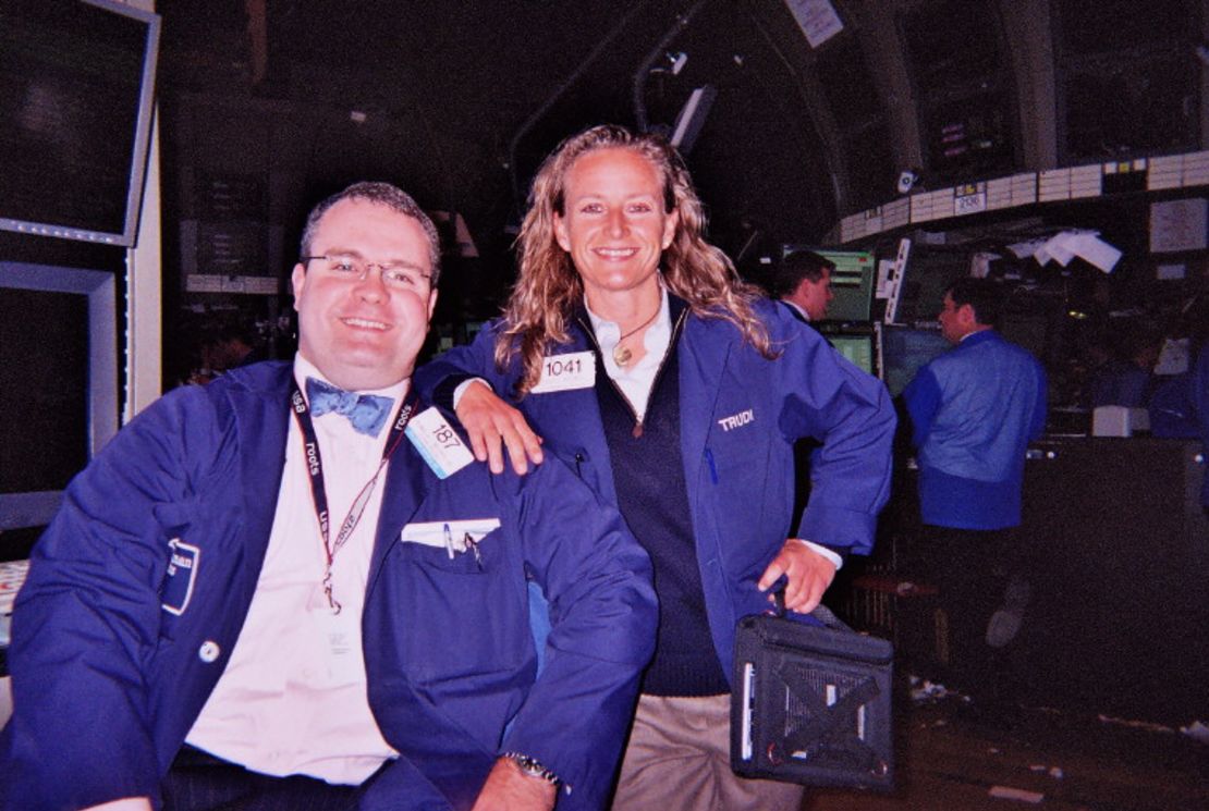 Trudi Wagner, a former NYSE floor broker, poses for a photo with another broker, Ronald Moser, during her time at the New York Stock Exchange in 2007.
