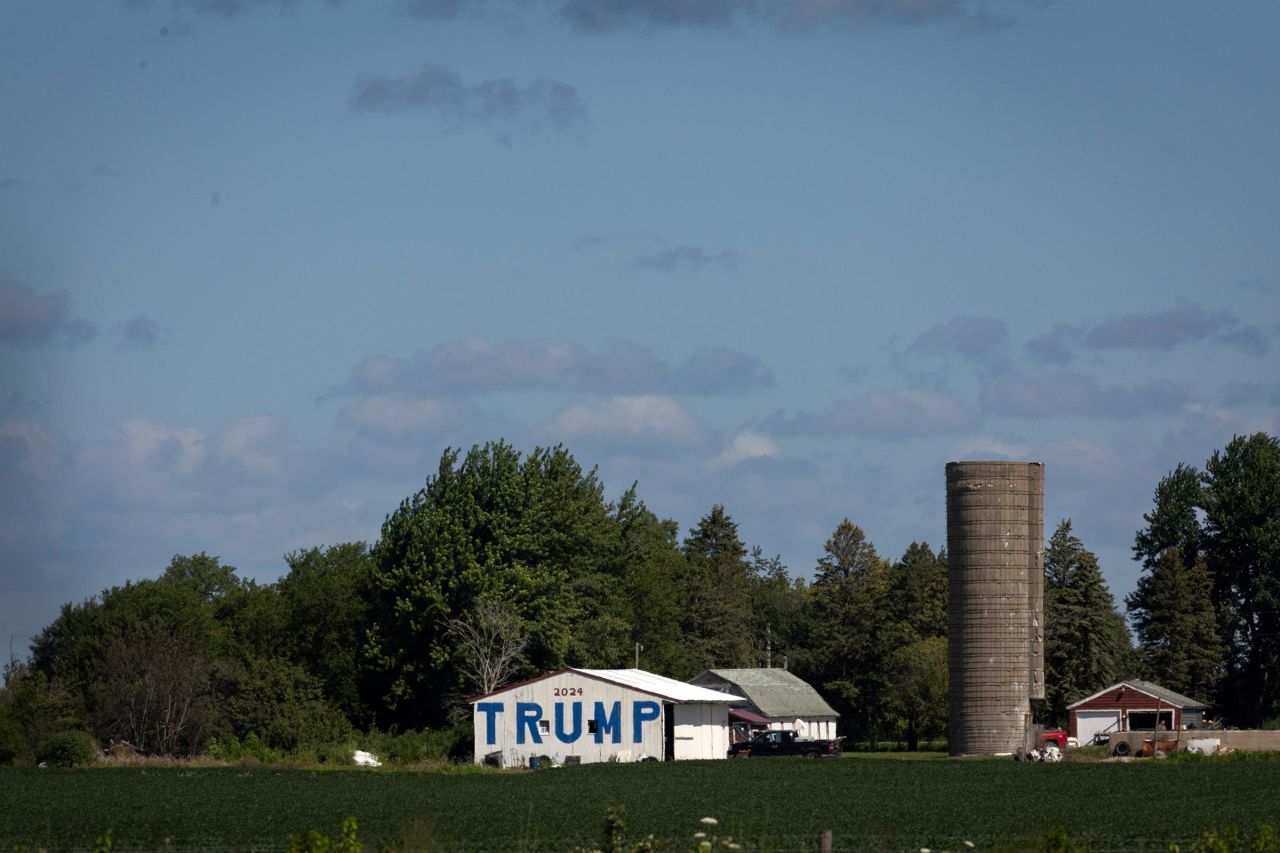 A farmer uses a barn to show support for Republican presidential candidate former President Donald Trump on August 10, 2024 near Charles City, Iowa. 