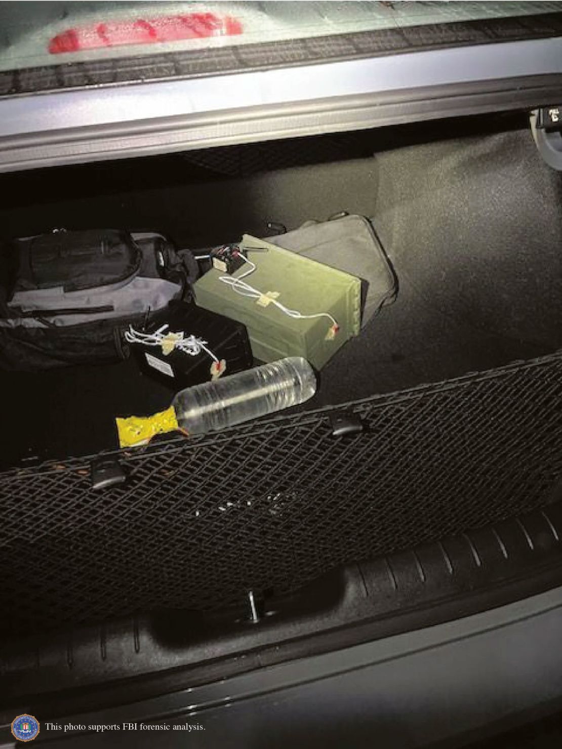 Two explosive devices as they were first discovered in the trunk of Thomas Crooks' car. The receiver for the remote detonation was switched off; the explosive devices had several design defects.