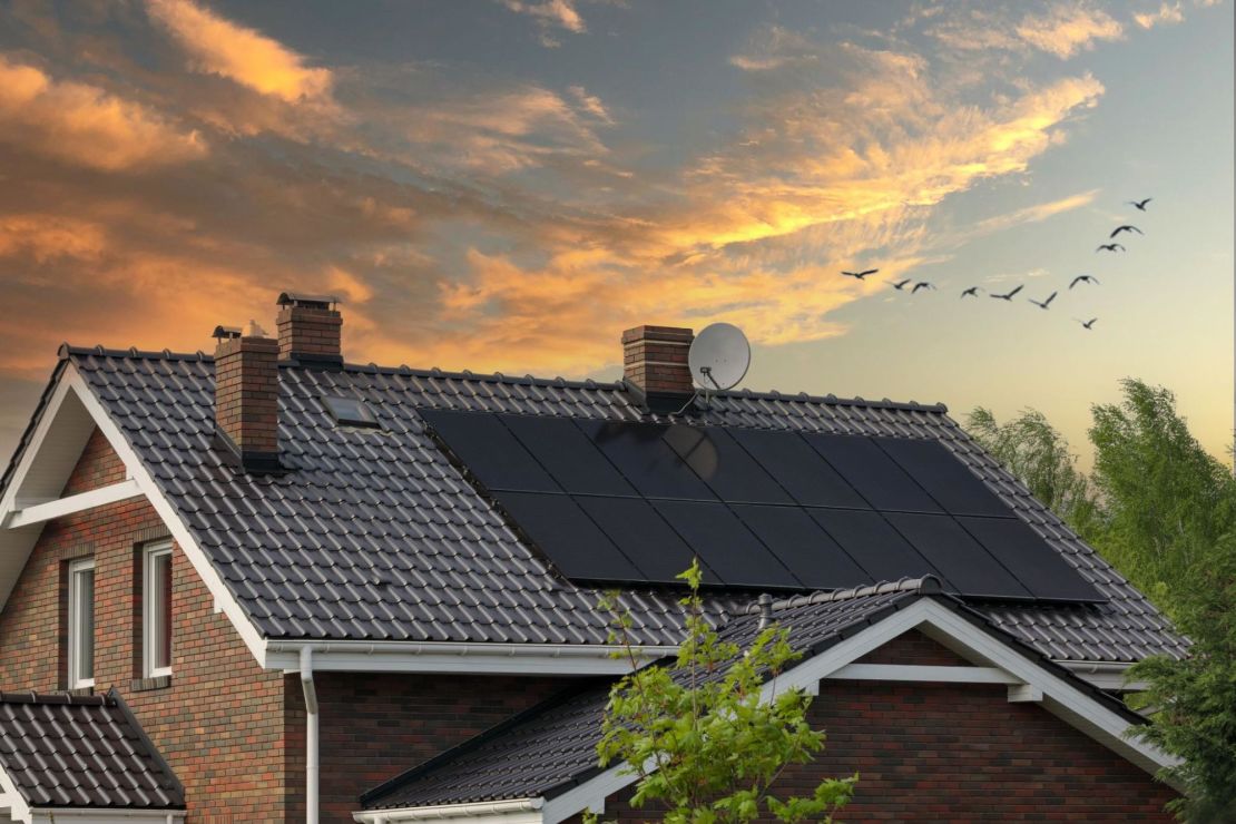 Monocrystalline solar panels on a roof