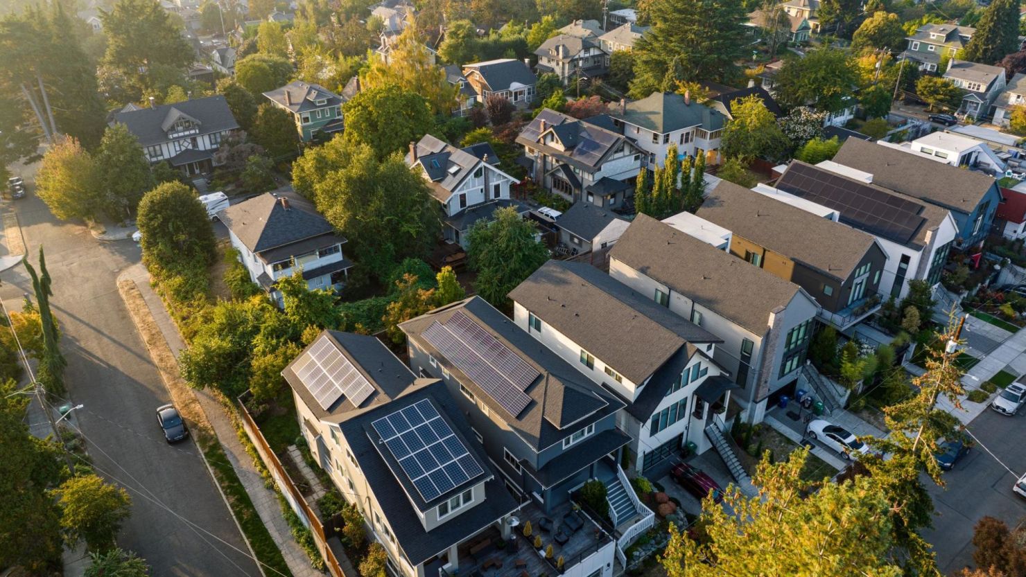 Residential solar panels on several homes in the same neighborhood