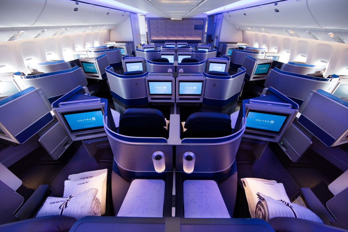 A photo of a United Polaris business class cabin