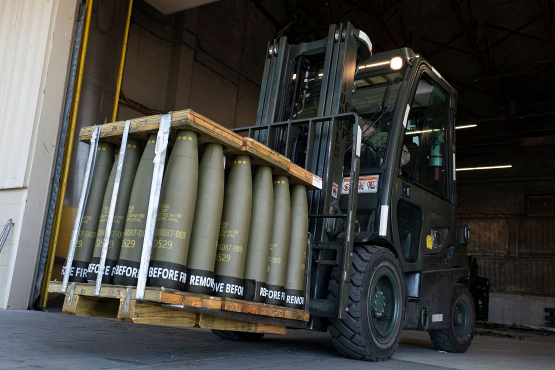 Airmen with the 436th Aerial Port Squadron use a forklift to move 155 mm shells ultimately bound for Ukraine, on April 29, 2022, at Dover Air Force Base in Delaware.