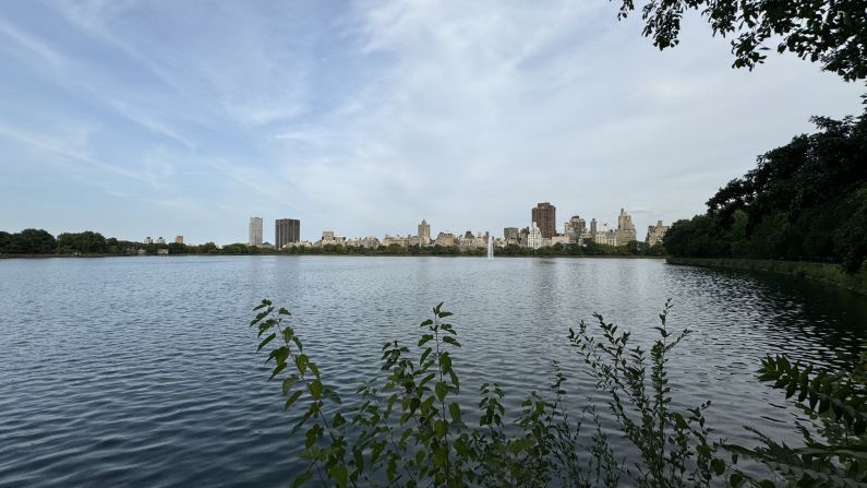 An ultrawide view of Jacqueline Kennedy Onassis Reservoir and the east side on the horizon