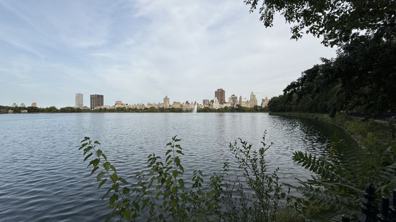 An ultrawide view of Jacqueline Kennedy Onassis Reservoir and the east side on the horizon