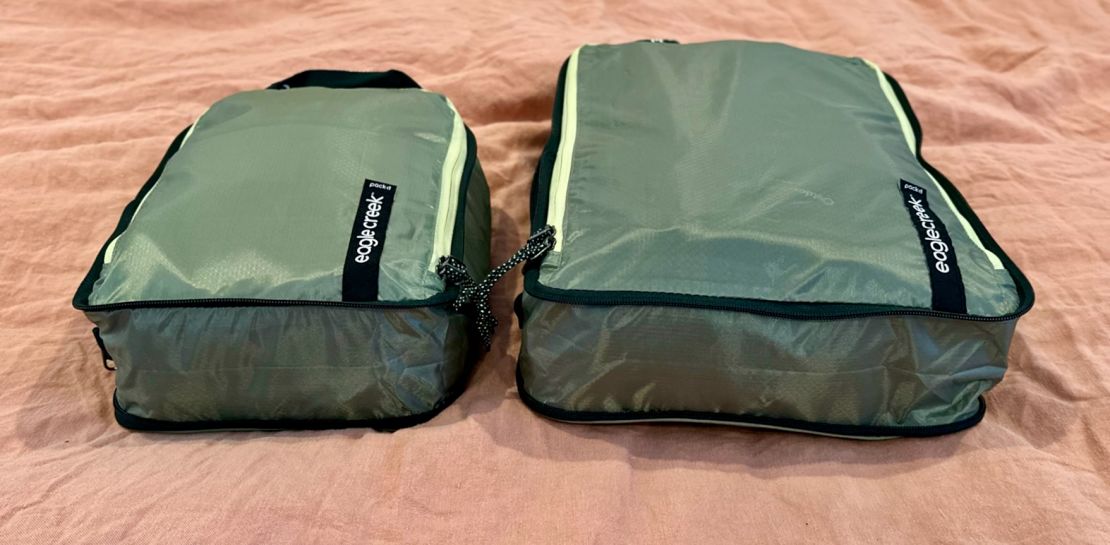 A photo of two Eagle Creek Isolate Packing Cubes