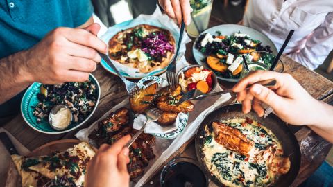 underscored friends eating out restaurant