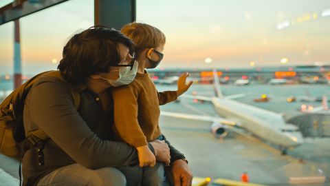 underscored man boy airport plane