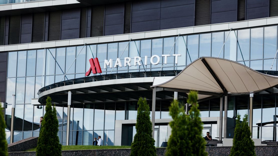 A photo of a Marriott sign on the exterior of a hotel.