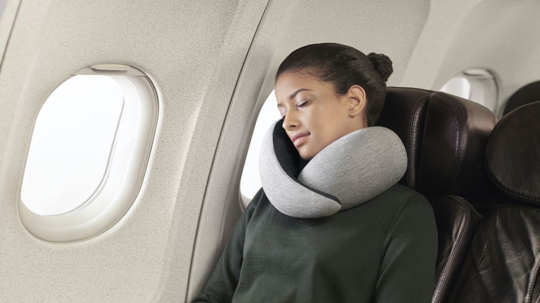 Ostrich Pillow travel gadget, How to sleep on a plane