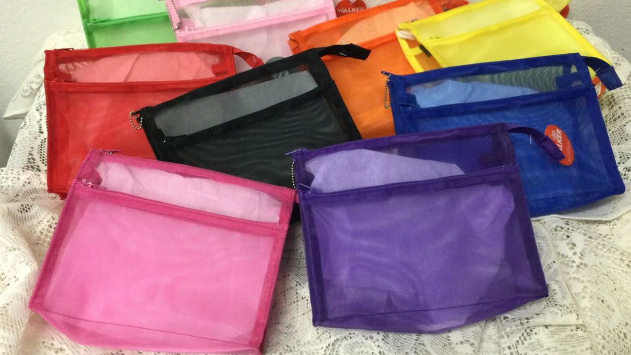 underscored SandFOriginals Double Zipper Walker Bags.jpg