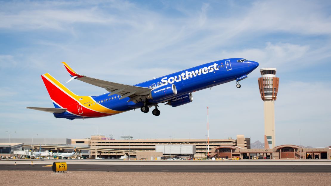 southwest plane takeoff tower in background