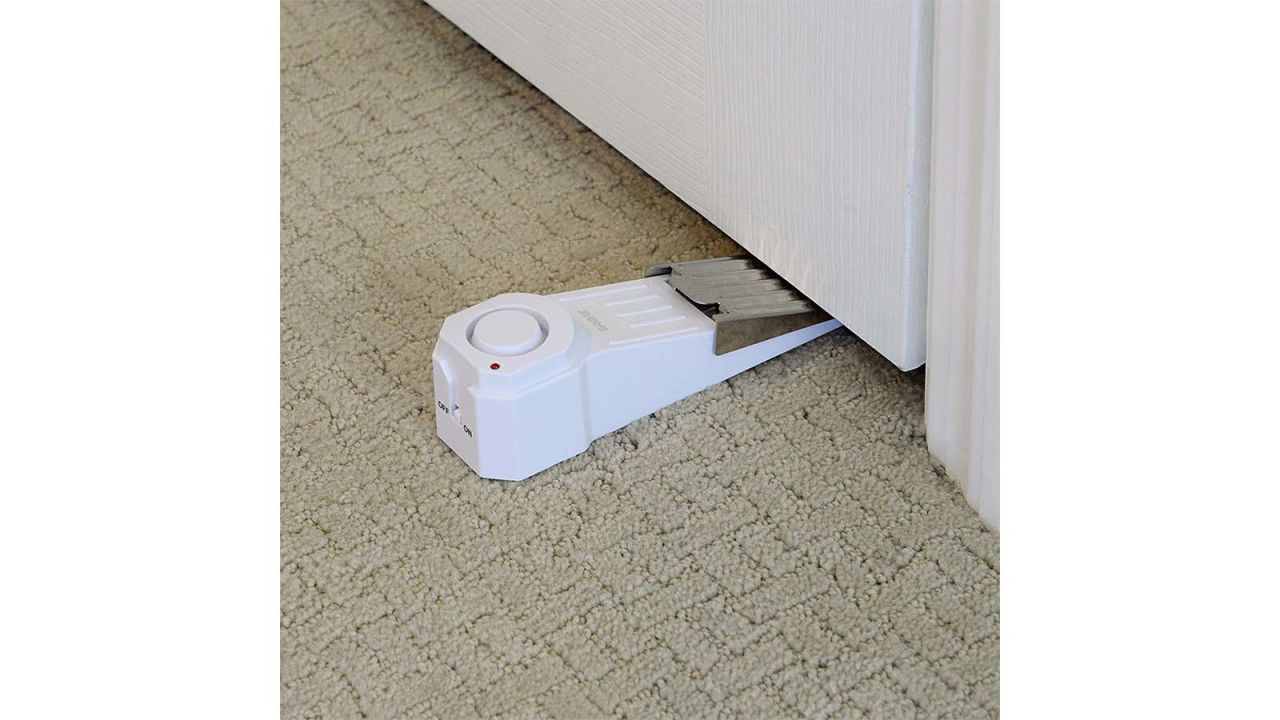 underscored traveldoorlocks Sabre Wedge Door Stop Security Alarm