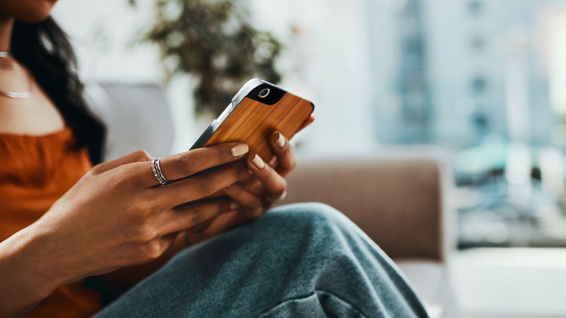 underscored woman on cell phone