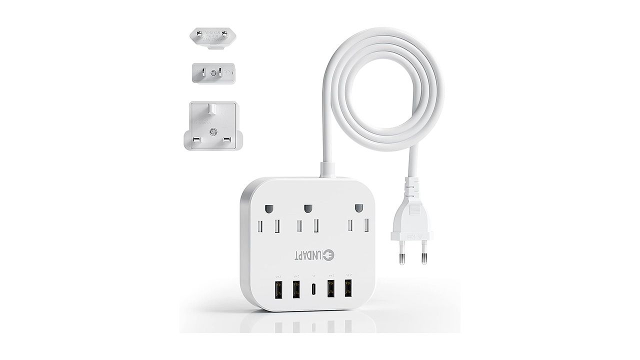 A photo of the Unidapt European power strip and its included adapters 
