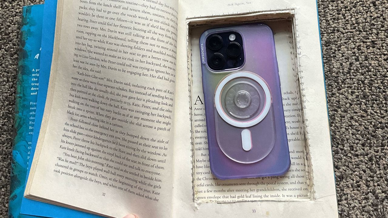 An example of a phone hidden in a hollowed-out book. Librarian Molly Riportella hopes to get the phones to abused women throughout her area and beyond.
