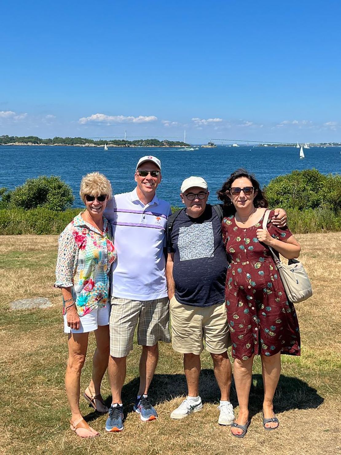 Michelle and Leonor, pictured together with their husbands Rich and Filipe, met in person again in 2022.