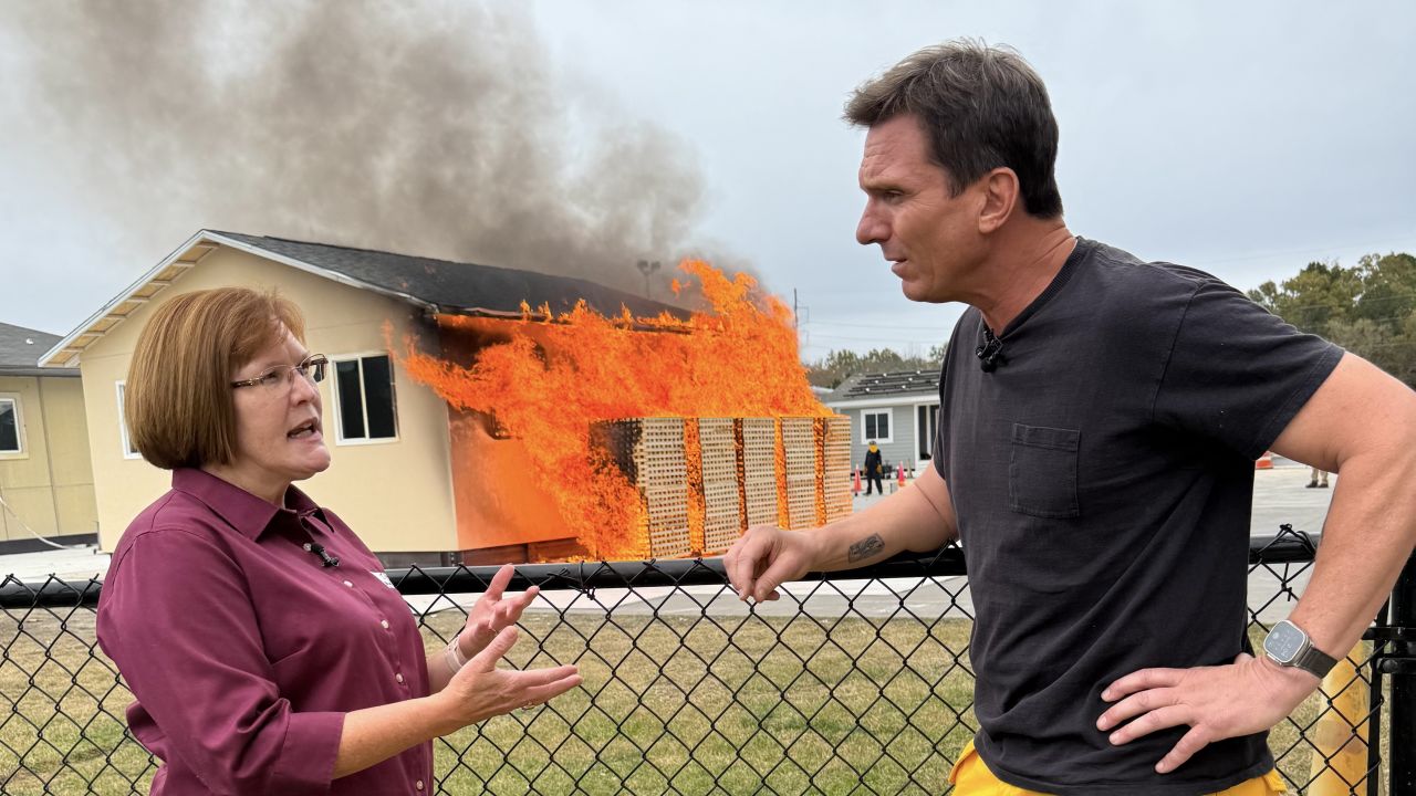 CNN’s Chief Climate Correspondent Bill Weir speaks with Anne Cope, Chief Engineer at the Insurance Institute for Business & Home Safety, while they conduct a controlled burn testing the resilience of different types of home construction and materials in Richburg, South Carolina.