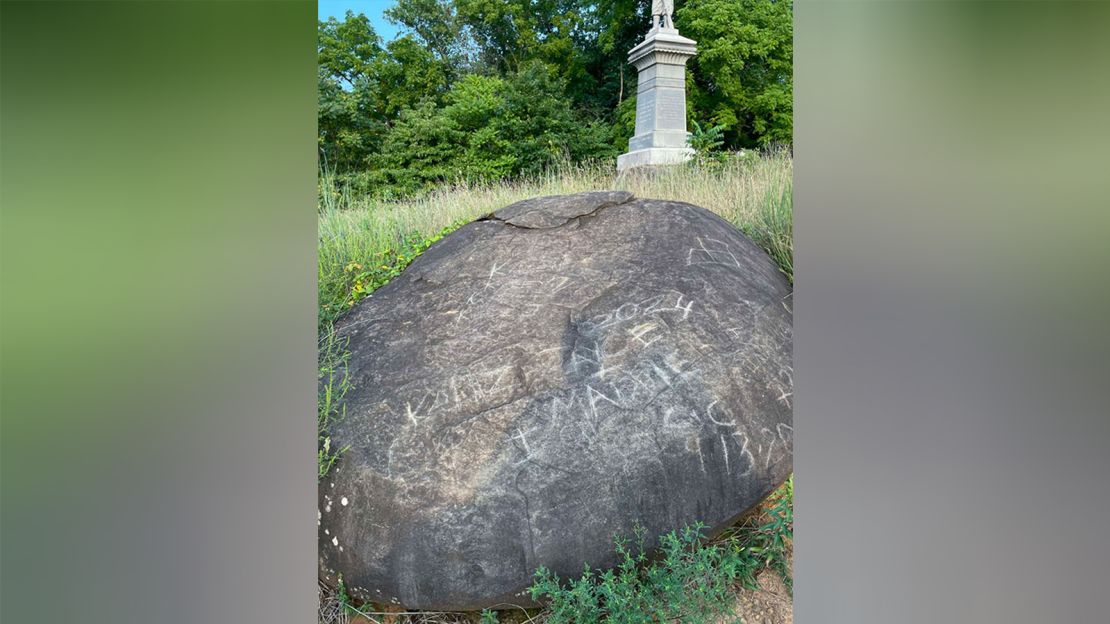 At Gettysburg National Military Park, names and other symbols were carved into a stone.