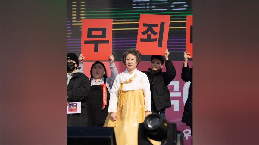 Choi Marja on stage at a Women's Day event hosted by the Korean Women's Hotline Organization on March 8th, 2025.