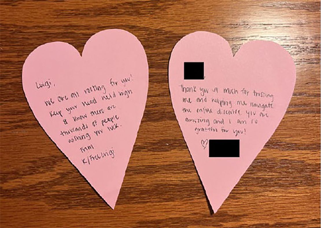 Two heart-shaped notes Mangione received in socks included in a bag of clothes his lawyers provided for him to change into before his February court appearance.