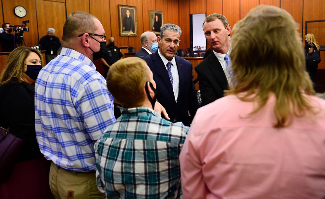 Attorneys consult with the family of Gloria Satterfield as Alex Murdaugh faced a bond hearing after allegedly misappropriating funds in connection with her death, in the Richland County Courthouse on October 19, 2021.