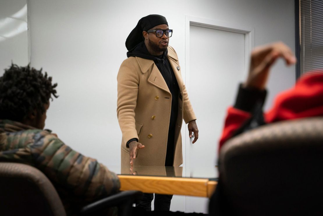 Dujuan "Zoe" Kennedy, a community organizer with FORCE Detroit, discusses violence prevention and other life lessons with his mentees in 2022 at The Block in Detroit's Cass Park.