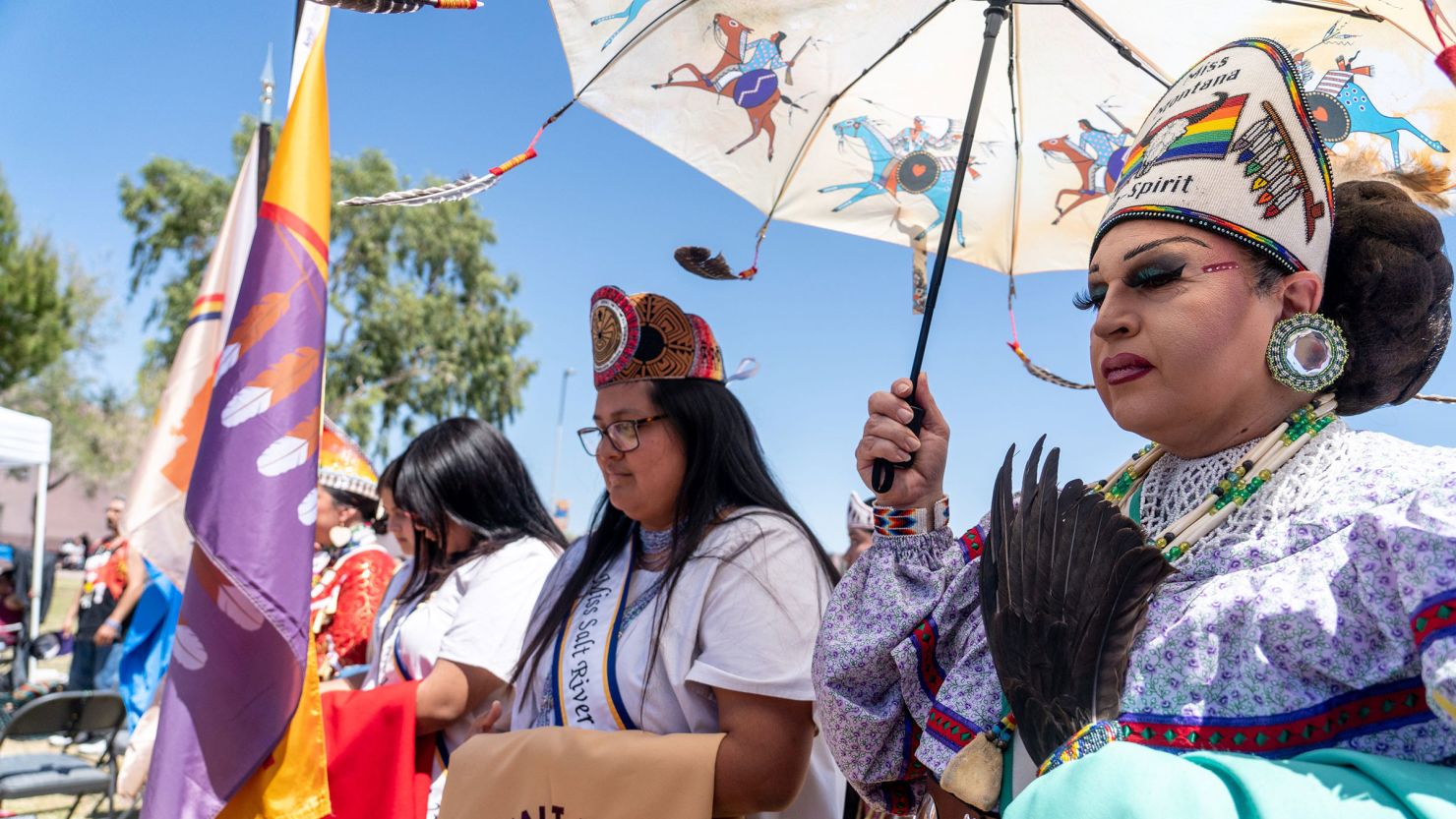 Miss Montana Two-Spirit Land Lakes, of the Chickasaw Tribe, right, attends the 3rd Annual Two Spirit Powwow at South Mountain Community College in Phoenix on April 15, 2023.