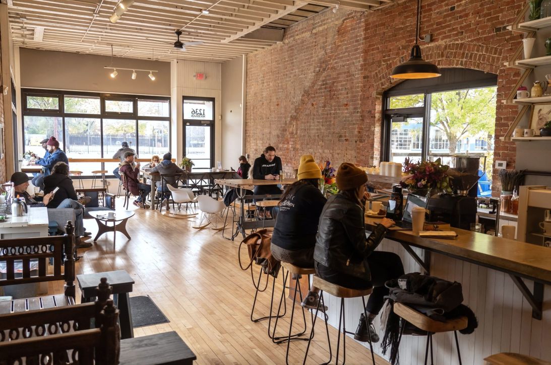 Customers hang out at James Oliver Coffee Co. in Detroit's Corktown neighborhood on November 4, 2021.
