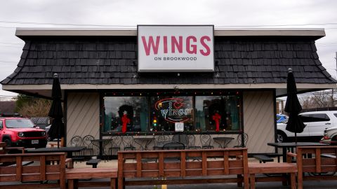 Michael Berkheimer, a regular at Wings on Brookwood, claims in 2016 he ordered boneless chicken wings from the restaurant, but ended up with a bone lodged in his esophagus. It caused an infection that has left him with a debilitating heart condition. Wings on Brookwood’s storefront in Hamilton, Ohio on Friday, Dec. 8, 2023.