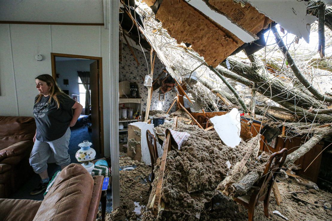 Jessie Perez and her aunt, Rebecca Aldridge, hid in a closet when severe weather came through Milton, Kentucky, on Thursday.
