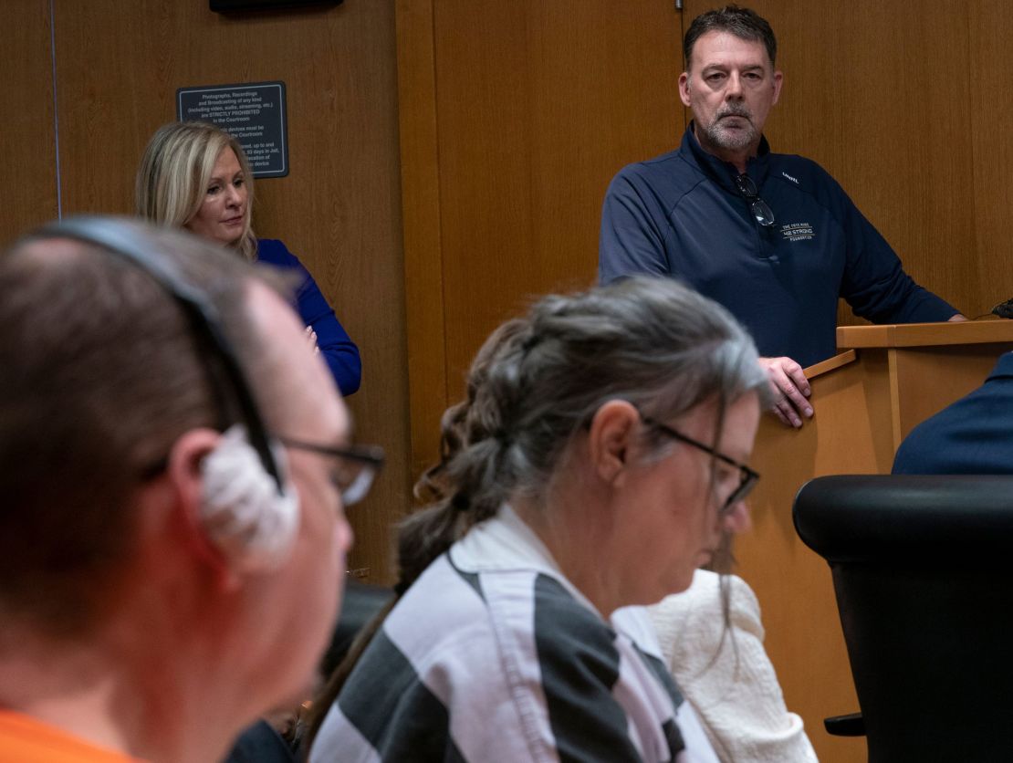 Buck Myre, father of Tate Myre who was killed in the 2021 Oxford School shooting, reads a victim statement Tuesday in Michigan district court.