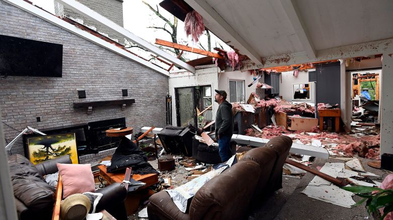 Ryan Whitten walks around in his destroyed home Thursday, May 9, 2024, in Columbia, Tenn. Severe weather and tornadoes caused damaged in Middle Tennessee on Tuesday afternoon.