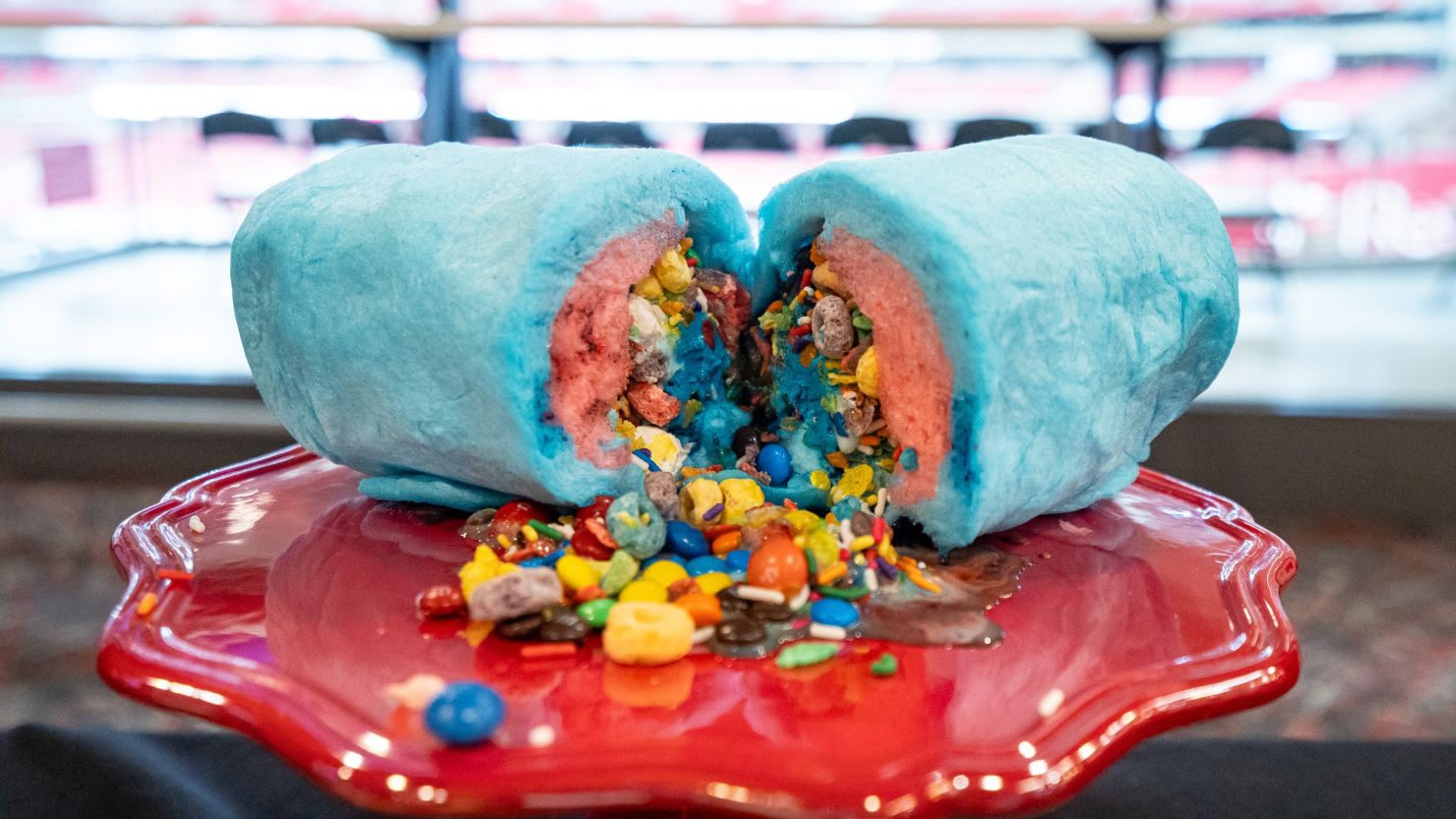 The Craft Culinary Concepts Cotton Candy Burrito with cotton candy flavored Ice cream, Fruity Pebbles, Froot Loops, marshmallows, Skittles, mini M&M's, gummy bears and sprinkles, photographed at the Cardinals and Craft Culinary Concepts media day at State Farm Stadium on Aug. 6, 2024, in Glendale, Arizona.